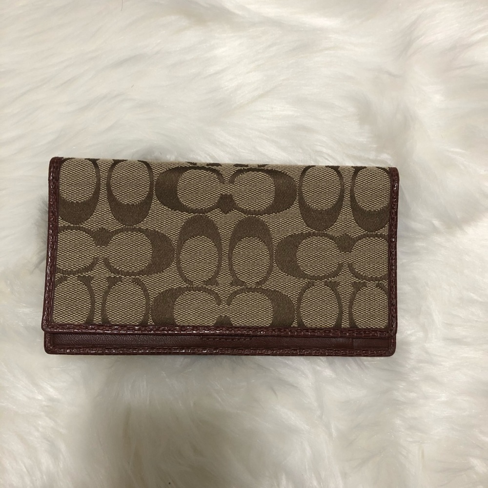 Coach check cover